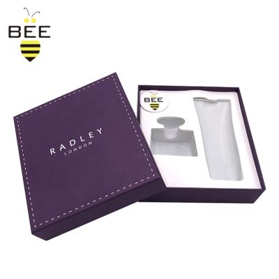 China Handmade Creative Luxury Perfume Skin Care Essence Set Cosmetic Paper Packaging Lid And Base Gift Box With Logo for sale