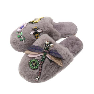 China Cushioning New Design Anti-slip fashional winter Slippers pearl butterfly and flower fashion fur Slippers soft indoor for women for sale