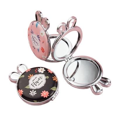 China Foldable Round Monogram Makeup Mirror Heart Pocket Personalized Leather Mirror for sale