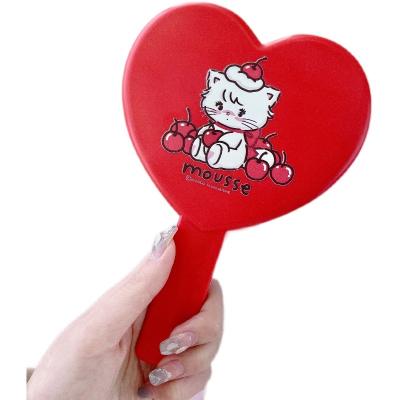 China Magnifying Cosmetic Hand Mirror With Handle Folding Simple Heart Shaped Hand Held Mirror for sale