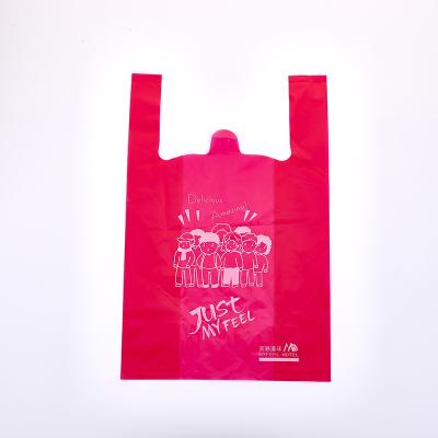 China Factory Price Eco Reusable Wholesale Custom Design Logo Die Cut Handle Custom Plastic Shopping Bag for sale