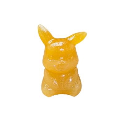 China Western Kenny Crystals Wholesale Natural Crystal Stone Craft Carving Semi-precious Gemstone Orange Honey Calcite Pikachu for sale