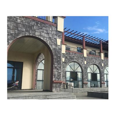 China Black Faux Stone Veneer Castle Cement Wall Cladding Rustic Residential Cultured Outdoor Artificial Stone Rustic Facade Cladding Stone for sale