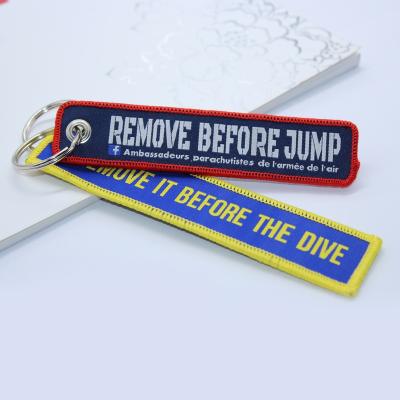 China Sustainable Fashionable Embroidered Patch Keychains Customized Logo And Color for sale