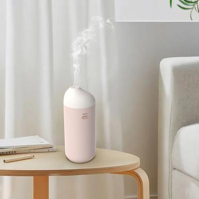 China New Product Pink 2.5W 5V Indoor White Blue Green Hotel/Household/Car/Commercial Office Bedroom Appliances Oil Air Humidifier for sale