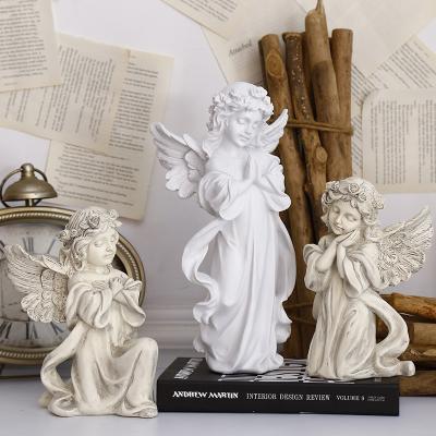 China Retro Resin Religious Statue Praying Angel Figurines Retro Decorations for sale