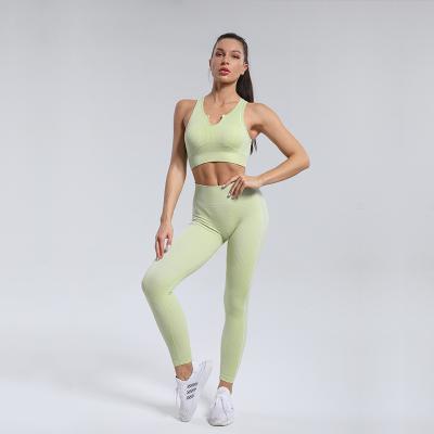 China 2022 New Arrival Europe and America Women's Breathable Solid Sport U Collar Bra Vests And Seamless High Waist Leggings Yoga Suit Set for sale