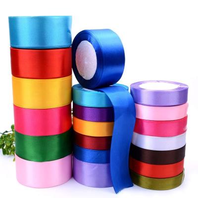 China Pre Tied Floral Custom Gift Wrapping Ribbon 100% Polyester Dot Elastic Satin Ribbon Bow With Stretch Loop for sale