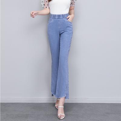 China Breathable Jeans For Women Flare Denim Pants Top Quality Light Blue Elastic Waist Raw Leg Opening With Tassels Ankle Length for sale