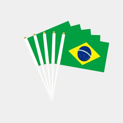 China Bright Color Fast Delivery Hand Waving Brazil National Flag Polyester Small Hand Held Custom Flags Stick Material Flags for sale