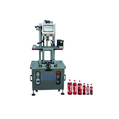 China Food Factory Supplied Coke Capsule Twist Off Vacuum Squeezing FXZ-4L Online Capping Machine for sale