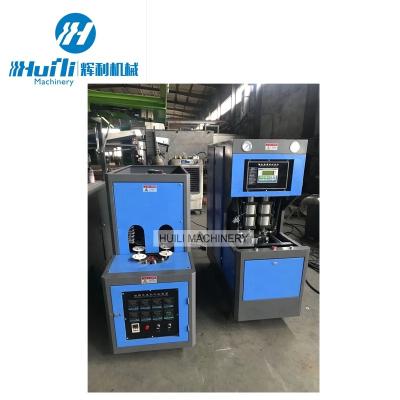 China Plastic Bottle Semi Automatic 2cavity Pet Blowing Machine à venda