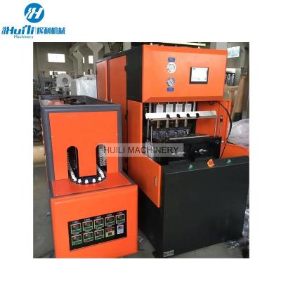 China Plastic Bottle Semi Automatic 4 Cavity Pet Blowing Machine à venda