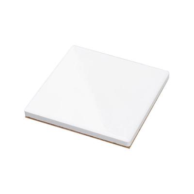 China Minimalist Matte Absorbent Ceramic Coasters Stone Coasters for Drinks with Cork Back for sale