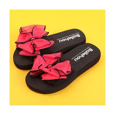 China New Breathable Summer Slippers Fashion Use Ladies Slippers Bow Tie Wedge Heel Thickened Rubber Bottom Slippers for sale