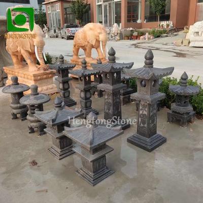 China Modern Asian Style Hand Carved Outdoor Decorative Black Marble Lantern Sculpture Marble Lighthouse for sale