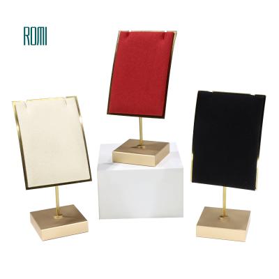 China Customized Luxury Eco-friendly ROMI Metal Microfiber Neck Stands Jewelry Design Necklace Holder Set Display In Stock for sale