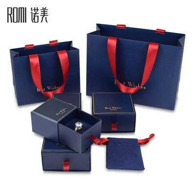 China Jewelery Packaging ROMI Hot Sale Navy Blue Jewelry Box Ring Earring Pendant Box Handbag Gift Set Packaging Boxes Jewelry Custom Logo for sale