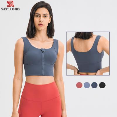 China Breathable Women Yoga Bra Black And White Yoga Bra Top Active Wear With Front Zipper for sale