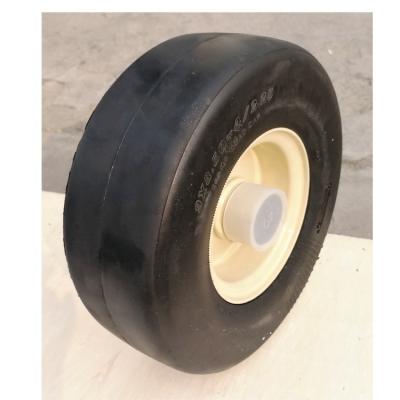 China 9x3.50-4 Natural Rubber Flat Free Tire And Steel Wheel Set For Lawn Mower Riding Wheel for sale