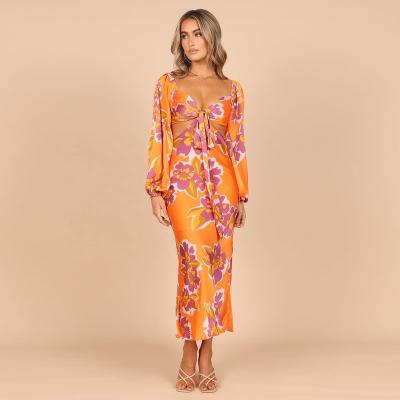 China OEM/ODM Anti-Static Spring Floral Print All Over Garden Long Sleeve Floaty Cut Back Midi Dresses for sale