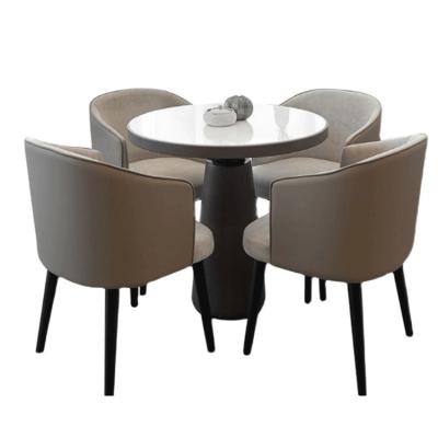 China Modern Modern Marble Round Table and Fabric Wood Legs Metal Base Chair 4 Seater for Dining Room Hotel Restaurant Furniture for sale