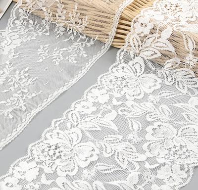 China Beautiful workable stretch fabric white floral lace trims ribbon hollow band embroidered for lingerie for sale