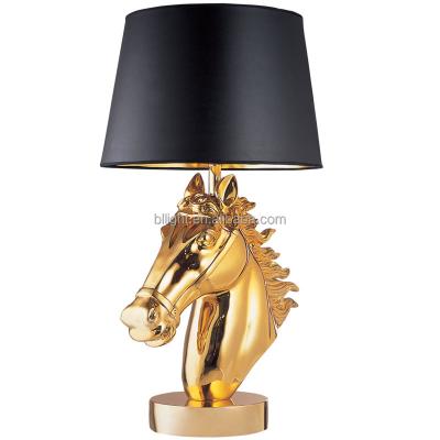 China Industrial Horse Base Gold Table Lamps For Home Horse Table Lamp for sale