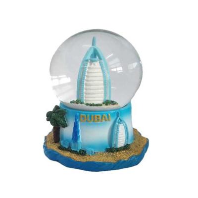 China Cheap Custom Mini Crystal Snow Globe Africa Dubai Water Globe Resin Gift Souvenir Maker City Tourist City Budapest UAE for sale