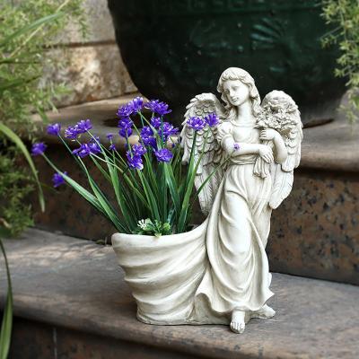 China Custom Wholesale French Flower Pot Vintage Country Angel Flower Garden Resin Indoor Indoor Flower Pot Planter for sale