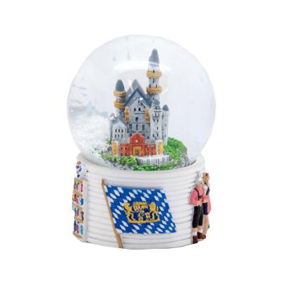 China Custom 3d Building Resin 45mm 65mm Africa Building Souvenir Germany Snow Globe Europe Country City Landscape Glass Water Dome Snow Globe for sale