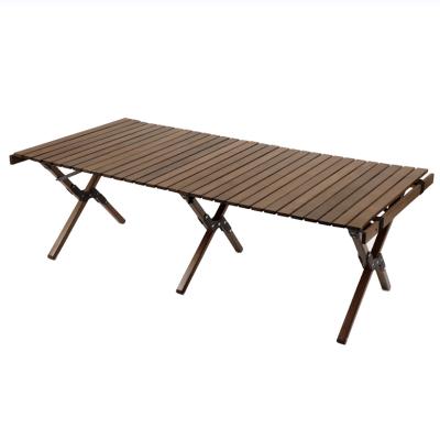 China Modern wholesale latest designs outdoor roll table egg walnut portable camping folding table for sale