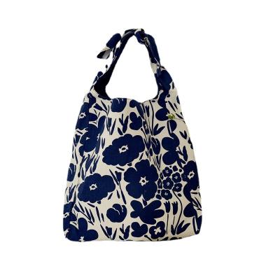 China 2021New Madame Canvas Floral Bag Large Capacity Street Shoulder Cross - Body Bag Japanese Lazy Style Floral Bag for sale