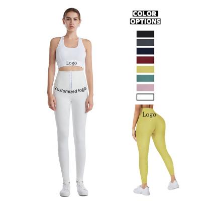 China Custom Logo Breathable 2 In 1 Women Workout Tummy Control Shaper Waist Trainer Gym White Yoga Top Pants Leggings for sale