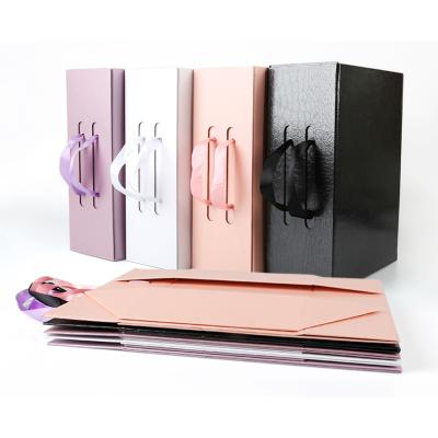 China Custom Recyclable Matte Black Magnetic Closure Paper Gift Box For Rectangular Folding Clothes Ribbon Handle Apparel Packaging for sale