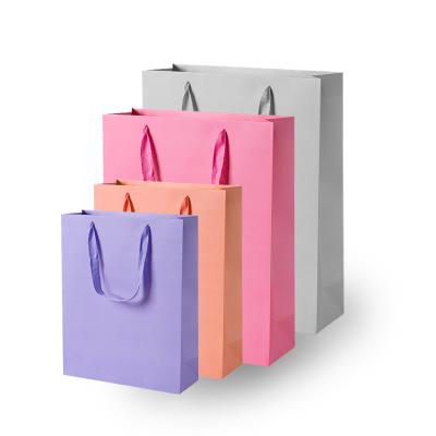 China Wholesale Luxury Recycled Materials Paper Gift Shopping Bags With Handle for sale