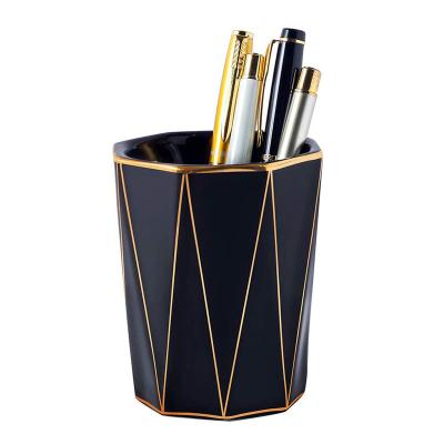 China Cartoon Ceramic Pen Holder Cone-Shape With Gold Line Unique Porcelain Makeup Brush Holder for sale