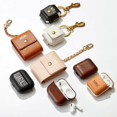 China Protable Wireless Earphone Key Chain Leather Case For Airpods Case Protective Cover for sale