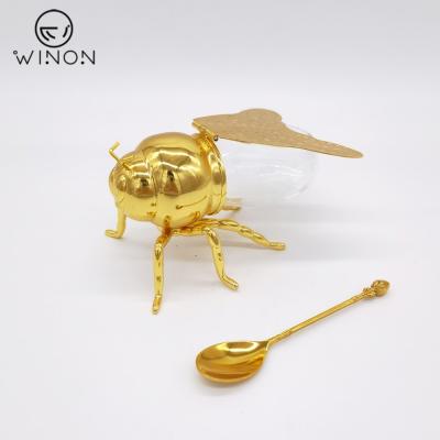 China Traditional Classics Design Dish Golden Bee Shape Special Decor Honey Jar Restaurant Table Metal Open Sweet Sugar Salt Jar With Spoon for sale