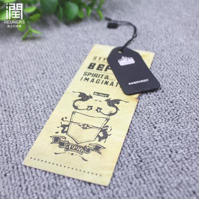 China Sustainable high quality printing paper hangtags label design embossed hangtags for clothing own logo for sale