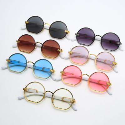 China Fashion Sunglasses Sunglasses 2022 Oversized Frameless Sunglasses New Polygon Metal Semicircle Design European and American Personality Style for sale