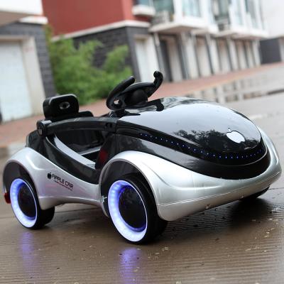 China Ride On Toy Double Drive Electric Independent Double Swing Luminous Four Wheel Electric Toy Car For Children for sale