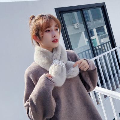 China Long winter new plush pearl buckle warm female cross scarf fashion thick soft scarf for sale