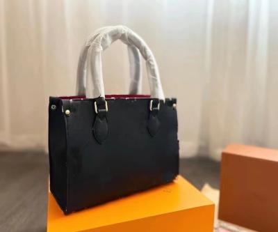 China Fashion Designer Handbags Wholesale Luxury Handbags Famous Brands Women's Black Tucked Handbag for sale