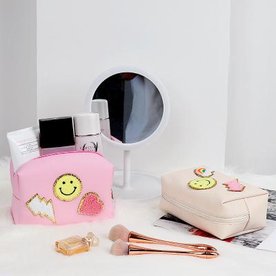 China Fashion Custom Embroidered Small Girl Zipper Makeup Bag Pouch Pu Leather Holdhold Square Waterproof Cute Travel Toiletry Cosmetics Bag for sale