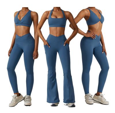 China Breathable Custom Logo Cheap Fitness Clothing  halter sports bra Butt Lift Flare Leggings Yoga Pants Leggings With Pockets Set for sale