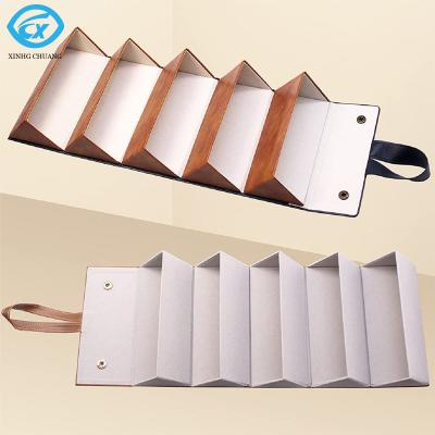 China Portable Space Saving Glass Sunglasses Box 5 Slots Folding Organizer Storage Display PU Leather Case for sale