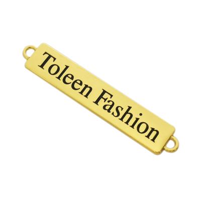 China Sustainable Hot Sale Engraved Brand Clothing Metal Tags Custom Metal Label For Shirt for sale