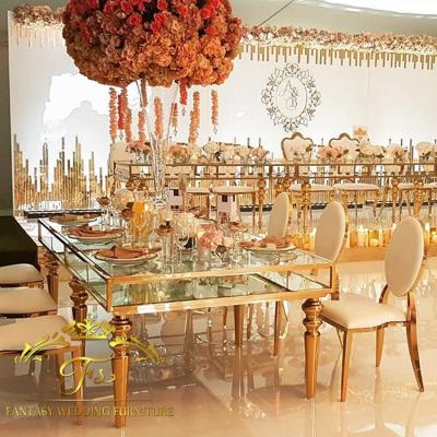 China Modern wedding event used 12 seater round stainless steel dining table with glass for sale