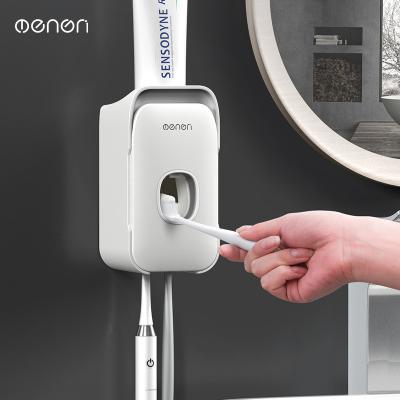 China Sustainable Fully Automatic Toothpaste Squeezer Set Wall Mounted Punchless Toothbrush Holder Lazy Squeeze Artifact for sale